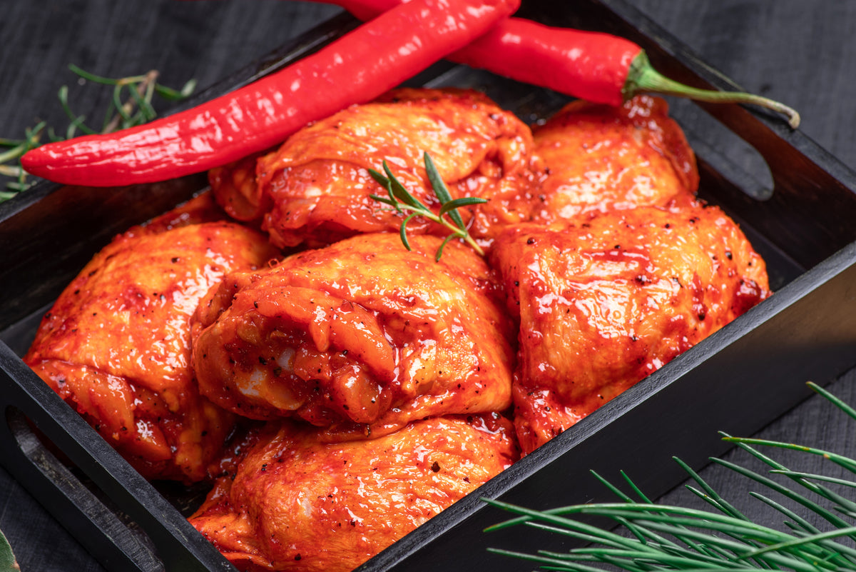 Chicken - Cuts - Thighs - Skin on, bone in - 500g